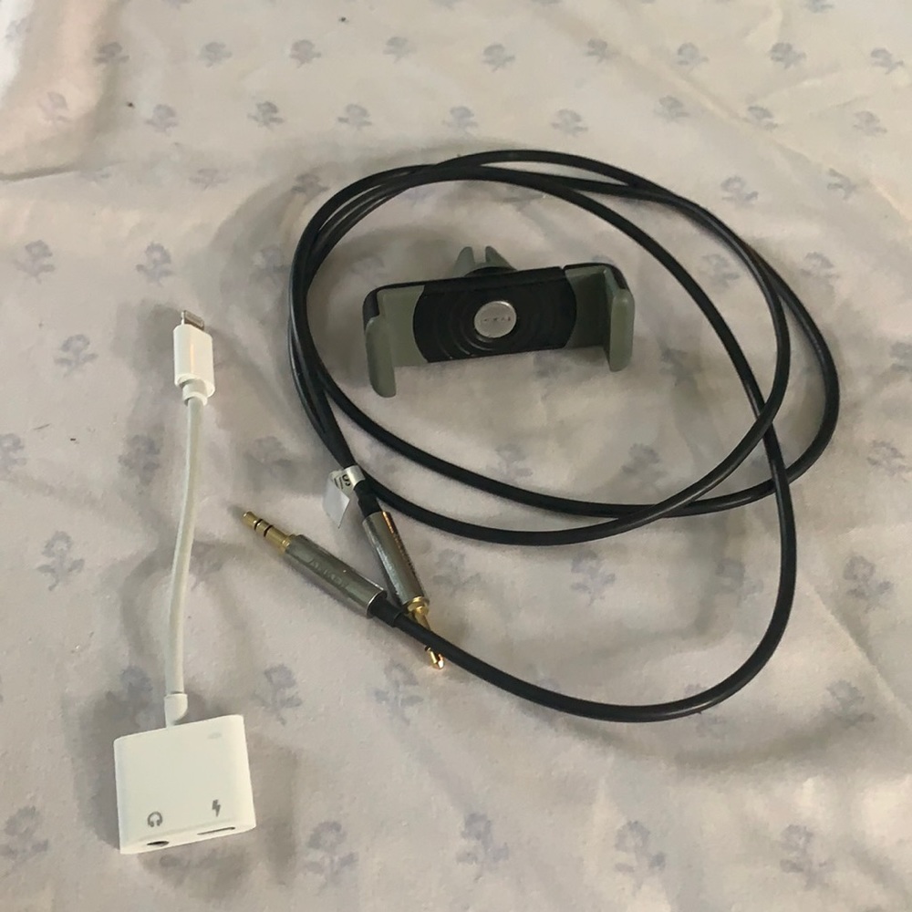 Aux cord, head phone adapter and phone vent clip